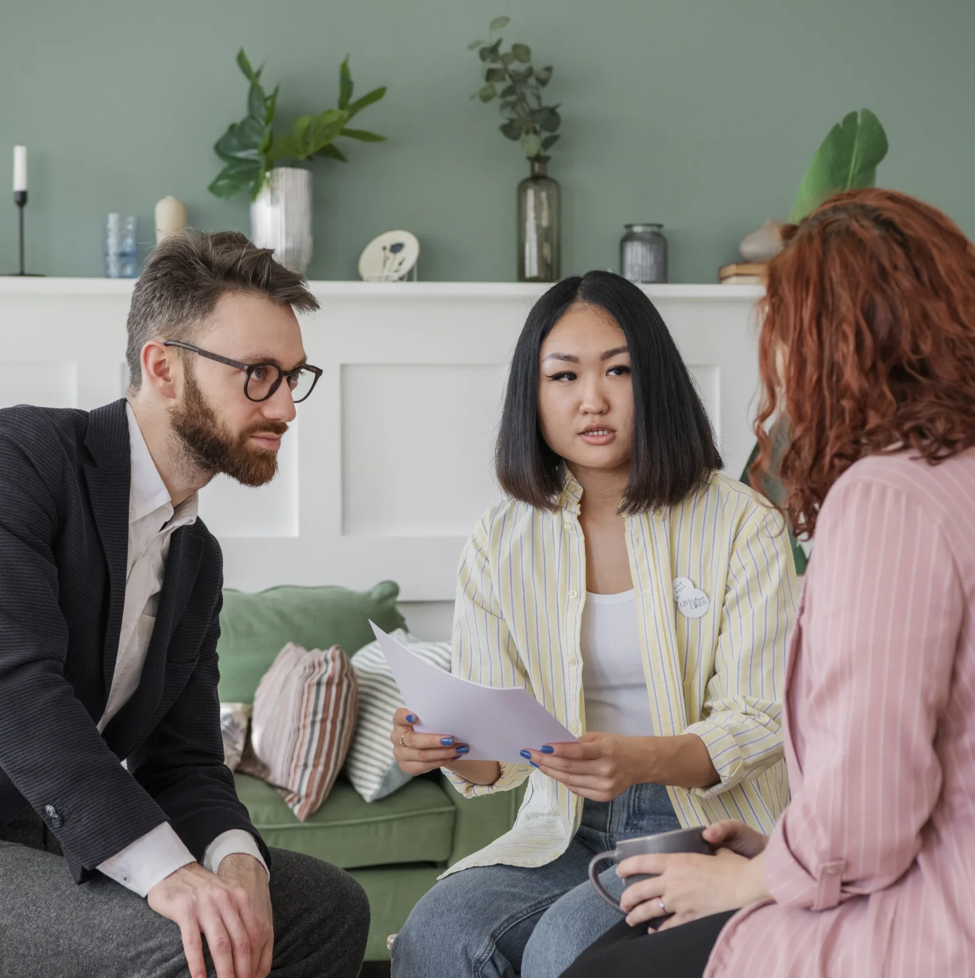people having debate while looking computer e1773248607444