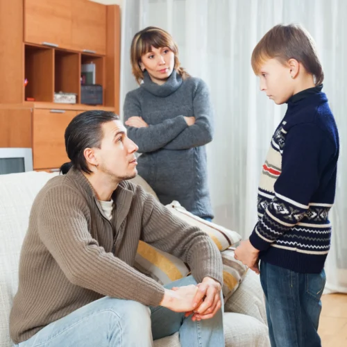 parents-berating-teenager-son parents-berating-teenager-son